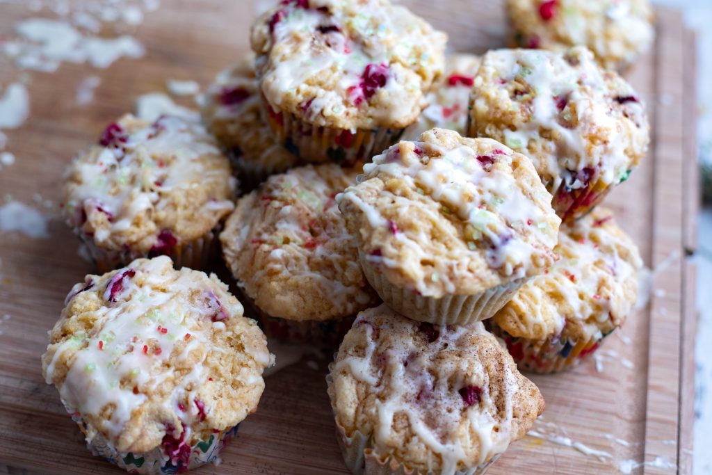 Cranberry Orange Pulp Muffins on a wooden board