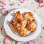 A plate full of fried wontons