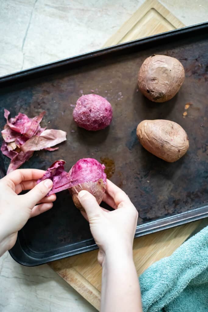 Peeling a purple potato