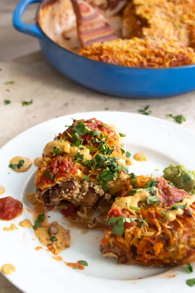 enchiladas cut open on a plate