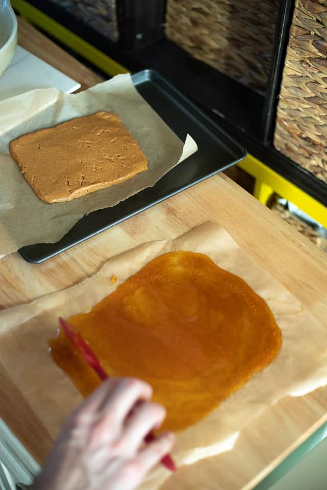 Shaping the caramel over parchment paper