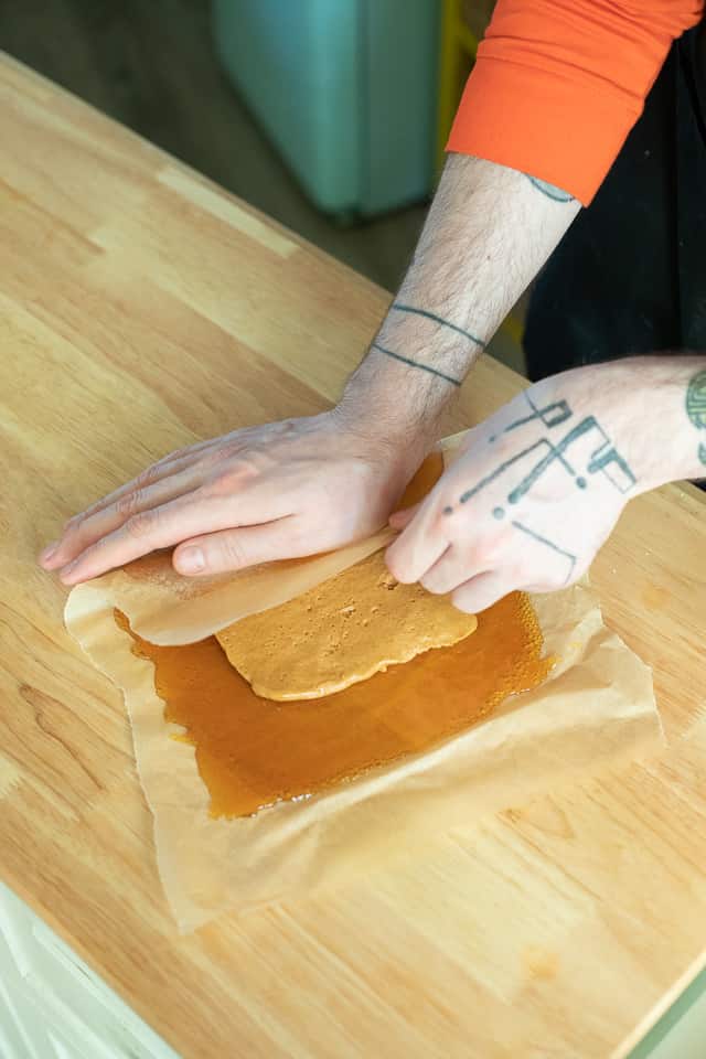 Folding the caramel over the peanut butter