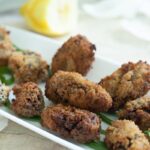 a plate of breaded and fried morels