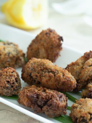a plate of breaded and fried morels