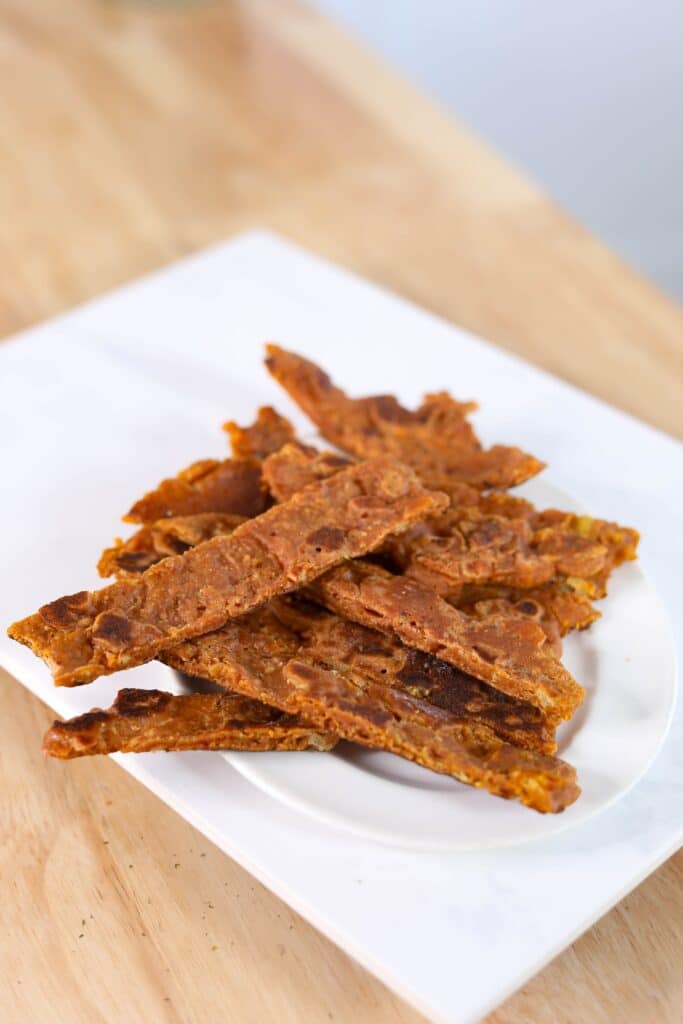 a plate of vegan jerky