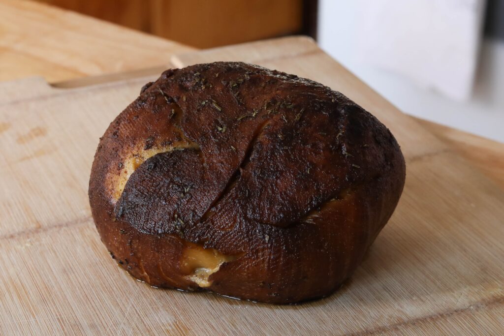 a seitan roast on a cutting board 