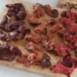 Chunks of seitan beef on a cutting board