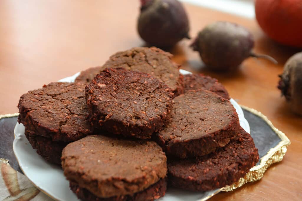 a plate stacked with veggie burgers