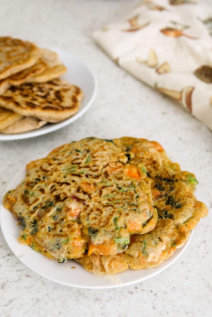 a plate of vegetable pancakes on a plate